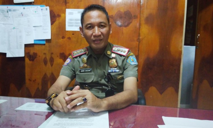 Kepala Satuan Polisi Pamong Praja Kota Kendari, Amir Hasan. (Foto: Hasrul Tamrin/SULTRAKINI.COM)