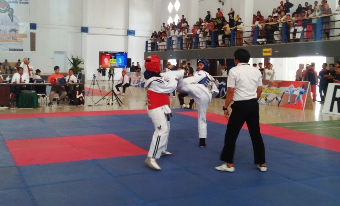 Suasana pertandingan kejurprov taekwondo, Sabtu (24/8/2019). (Foto: Muh Yusuf /SULTRAKINI.COM).